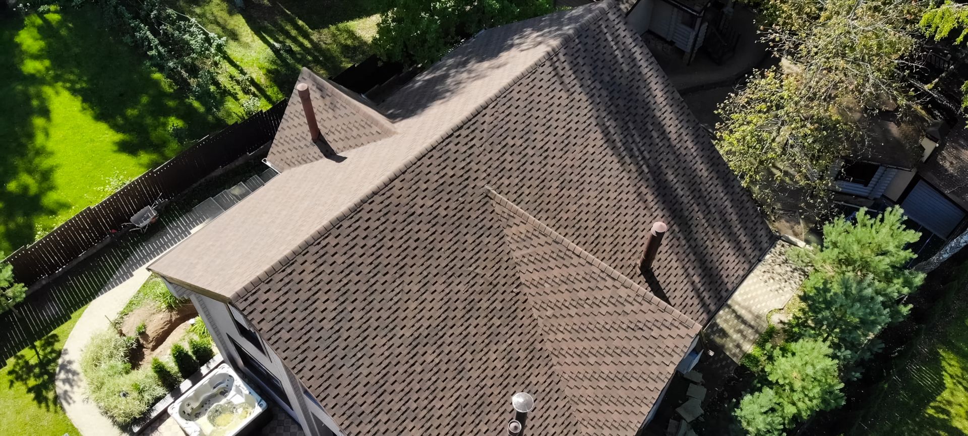 Local storm / roofing imagery from Team’s prior site — not labeled as a Team completed job